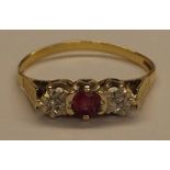 9ct gold ruby and diamond chip trilogy ring 1.8g size Q