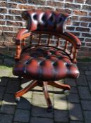 Ox blood colour button back leather swivel chair