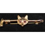 9ct gold fox mask  / riding crop bar brooch set with ruby eyes 4.1g