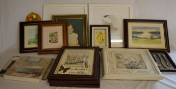 Large number of framed pictures