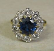 18ct gold sapphire and diamond cluster ring, sapphire 3 ct, diamond total 1.60 ct, size R, total