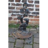 Cast iron stick stand and a boot jack