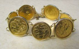9ct gold bracelet consisting of 4 full and 3 half sovereigns (full sovereigns - 1907,1907, 1905