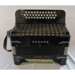 Cased Hohner Amati III accordion