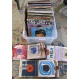 Quantity of 33 rpm LPs and 7" singles inc Elvis, Jethro Tull, The Beatles, The Doors, Santana and
