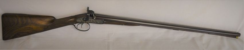 Purdey muzzle loading percussion cap shotgun with rosewood stock overall length 117cm. Purdey have