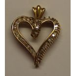 Heart shaped pendant marked 10k set with diamonds, weight approximately 4.2g