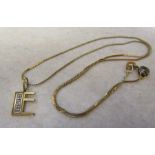 14ct 'E' pendant (H 15 mm) with diamond accent with 9ct gold necklace total weight 1.7 g