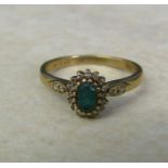 9ct gold ring with green gemstone and diamond chips size O/P weight 2.5 g