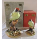 2 boxed Royal Crown Derby green woodpeckers H 24 cm signed M.E.T and H 15 cm signed M Dudley