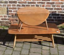 Ercol coffee table 105 cm x 46 cm and an Ercol circular drop leaf coffee table