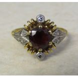 18ct gold diamond and red gemstone ring size M weight 4.2 g (red stone 6 mm x 6 mm)