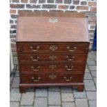 Small mahogany George III bureau with cock beading to the drawers, brass swan neck handles & bracket