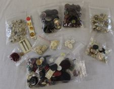 Large quantity of vintage buttons including mother of pearl, military etc