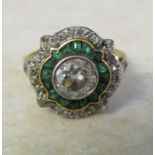 Tested as 18ct gold, emerald and diamond cluster ring, central diamond 1 ct, total weight 4.9 g,