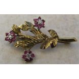 9ct gold diamond and ruby flower brooch weight 2.7 g