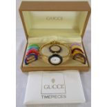 Gucci ladies watch with interchangeable coloured bezels complete with box and paperwork (currently