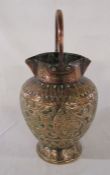 Ornate copper water jug H 42 cm