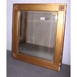 A rectangular gilt framed wall mirror, plate 18" x 15 1/2", a bevelled wall mirror in moulded walnut