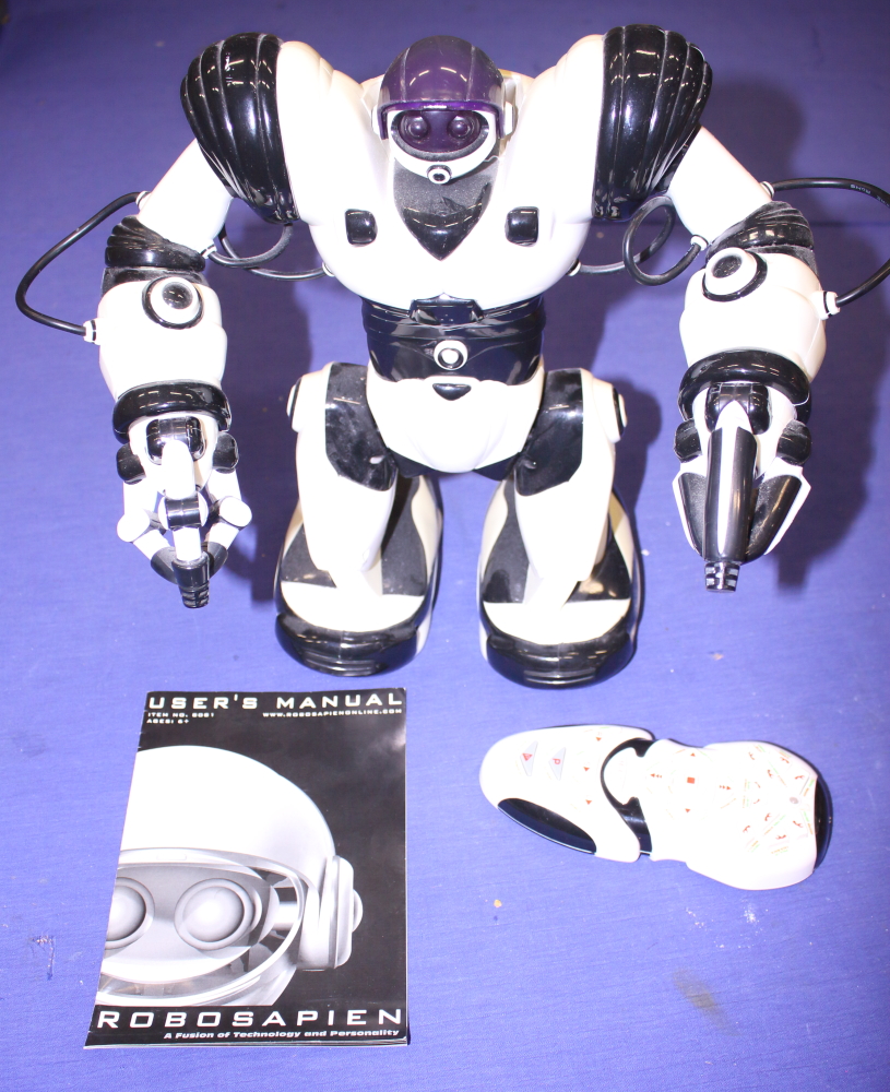 A "RoboSapien" battery operated robot, controller and instructions