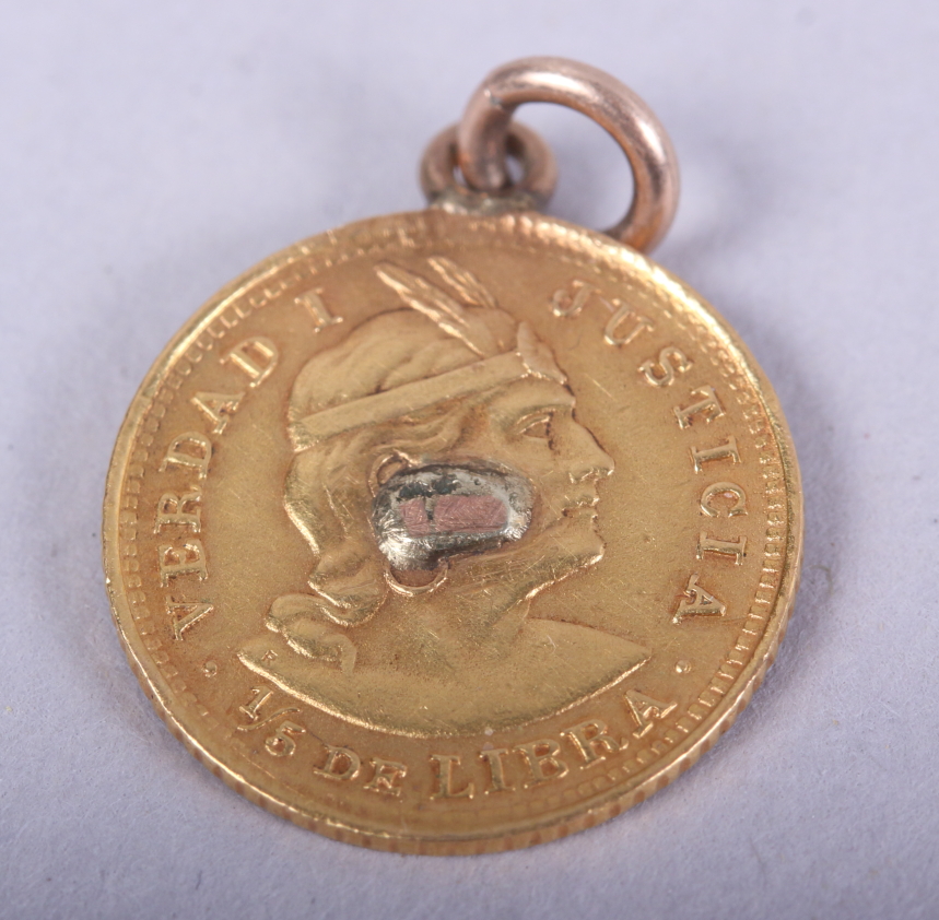 A Peruvian 1/5 de Libra gold coin, dated 1914, with hard mount and suspension loop, 1.8g gross - Image 2 of 2