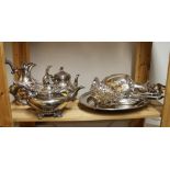 A silver plated ewer, a plated coffee pot, a similar teapot, two pairs of plated bonbon dishes and
