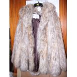 A mink jacket and a faux fur jacket, by Edina Ronay, size 10