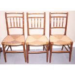 Three matched oak cane seat chairs