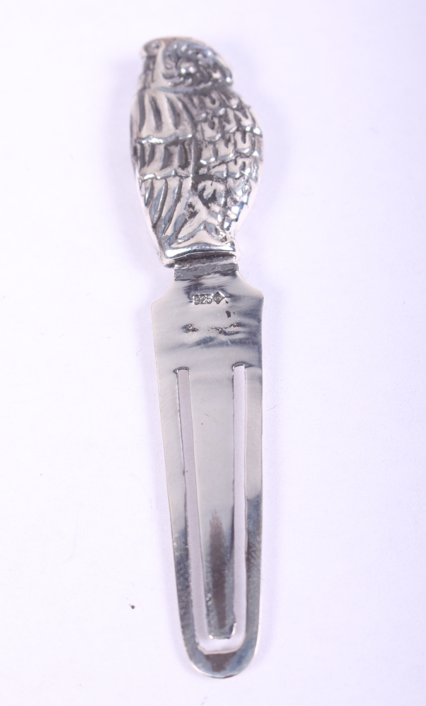 A white metal owl bookmark, stamped 925