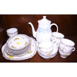 A Roslyn China "Nevis" pattern part teaset and a Wedgwood bone china "Petra" pattern coffee pot