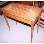 A 19th century polished as walnut fold-over top games table with inlaid decoration, on square