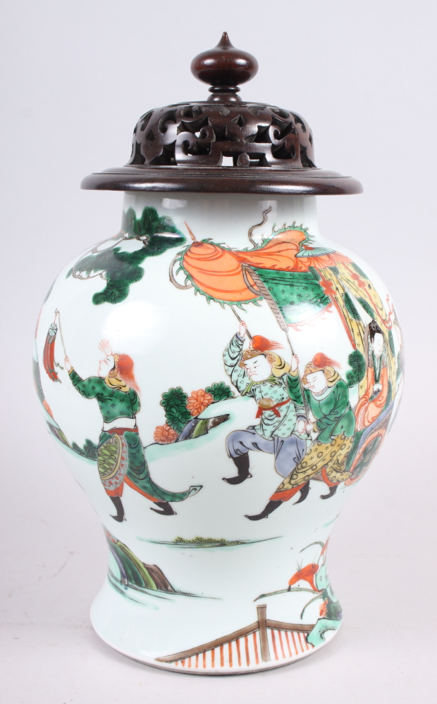 An early 18th century Chinese famille verte warrior decorated porcelain oviform jar, 10" high,
