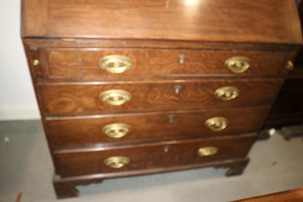 A late Georgian oak bureau bookcase, the upper section enclosed two arch top glazed doors over - Image 3 of 3