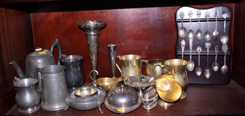 A silver plated vase, pewter mugs, brass mugs, cutlery, display spoons, a silver raised bonbon