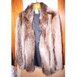 A lady's Zwirn of London raccoon fur jacket, size 14-16