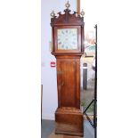 A 19th century oak long case clock with thirty-hour movement by Noakes, Battle, 82" high