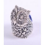 A white metal pincushion, formed as an owl, stamped 925