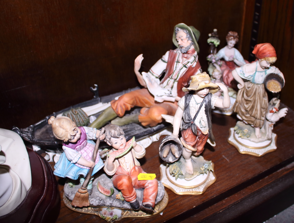 A Lladro model of a clown, on wooden stand, 13" high overall, two Capodimonte figure groups and - Image 2 of 2