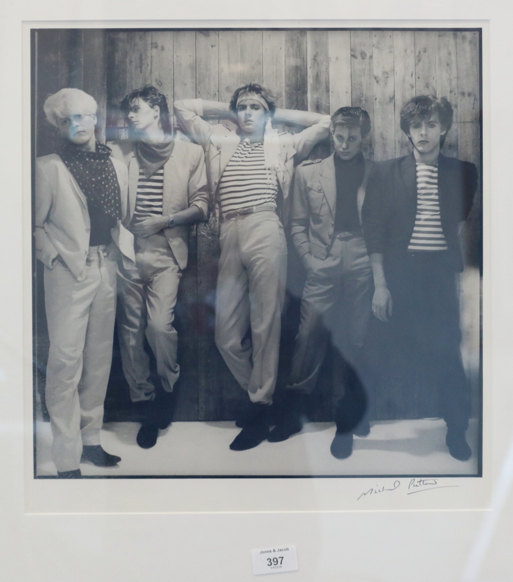 Michael Putland: a signed black and white photograph of Duran Duran, in silvered frame