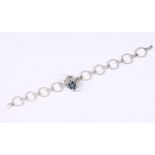 A white metal bracelet, stamped 14ct, with later attached sapphire and diamond white metal mount,