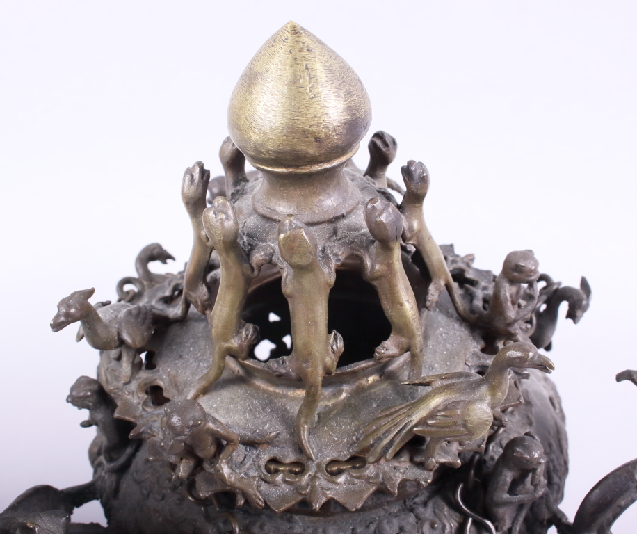 An 18th century style Chinese bronze censer, decorated dragons, monkeys, birds and lizards - Image 2 of 4