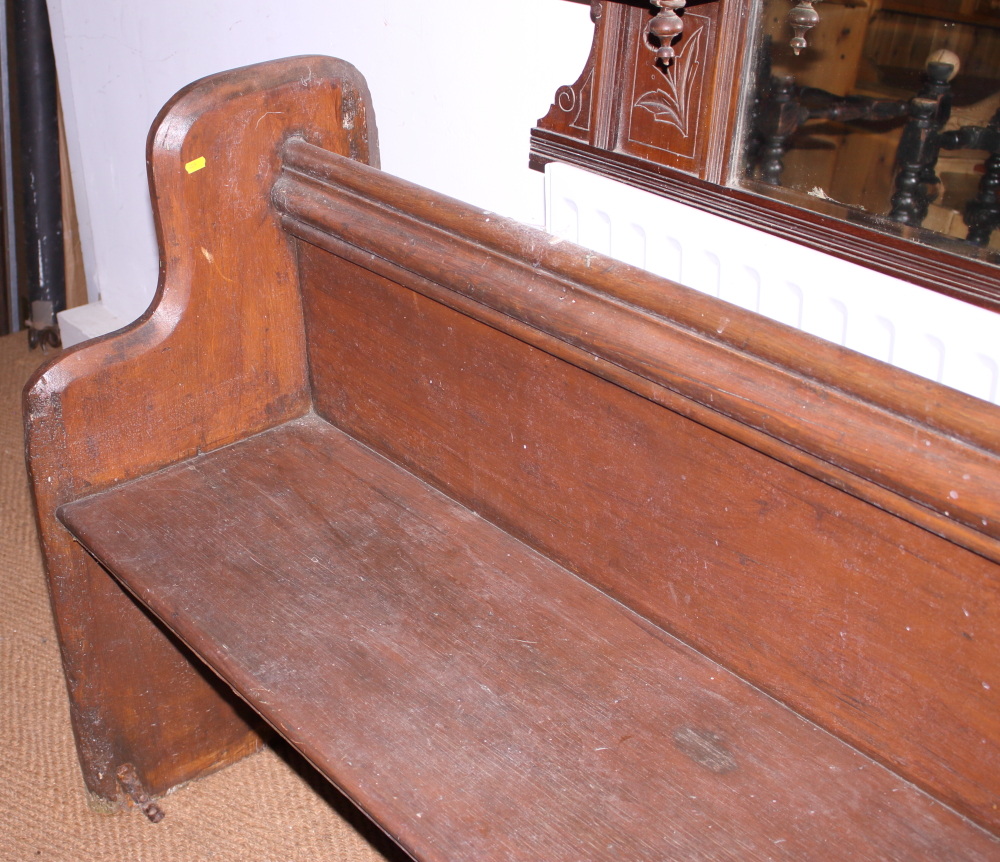 A pine pew, on panel end supports, 144" long approx - Image 2 of 2
