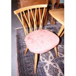 A set of six Ercol model 306 dining chairs with elm panel seats