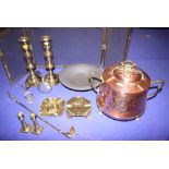 A two-handled brass and copper jar and cover, a brass firescreen, brass candlesticks and other