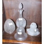 A 1920s cracked ice glass lampshade, two frosted glass lampshades and a cut glass decanter