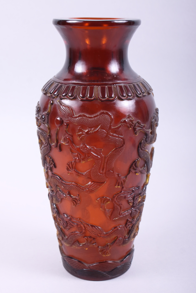 A Chinese Peking glass baluster vase, decorated dragons, 10" high