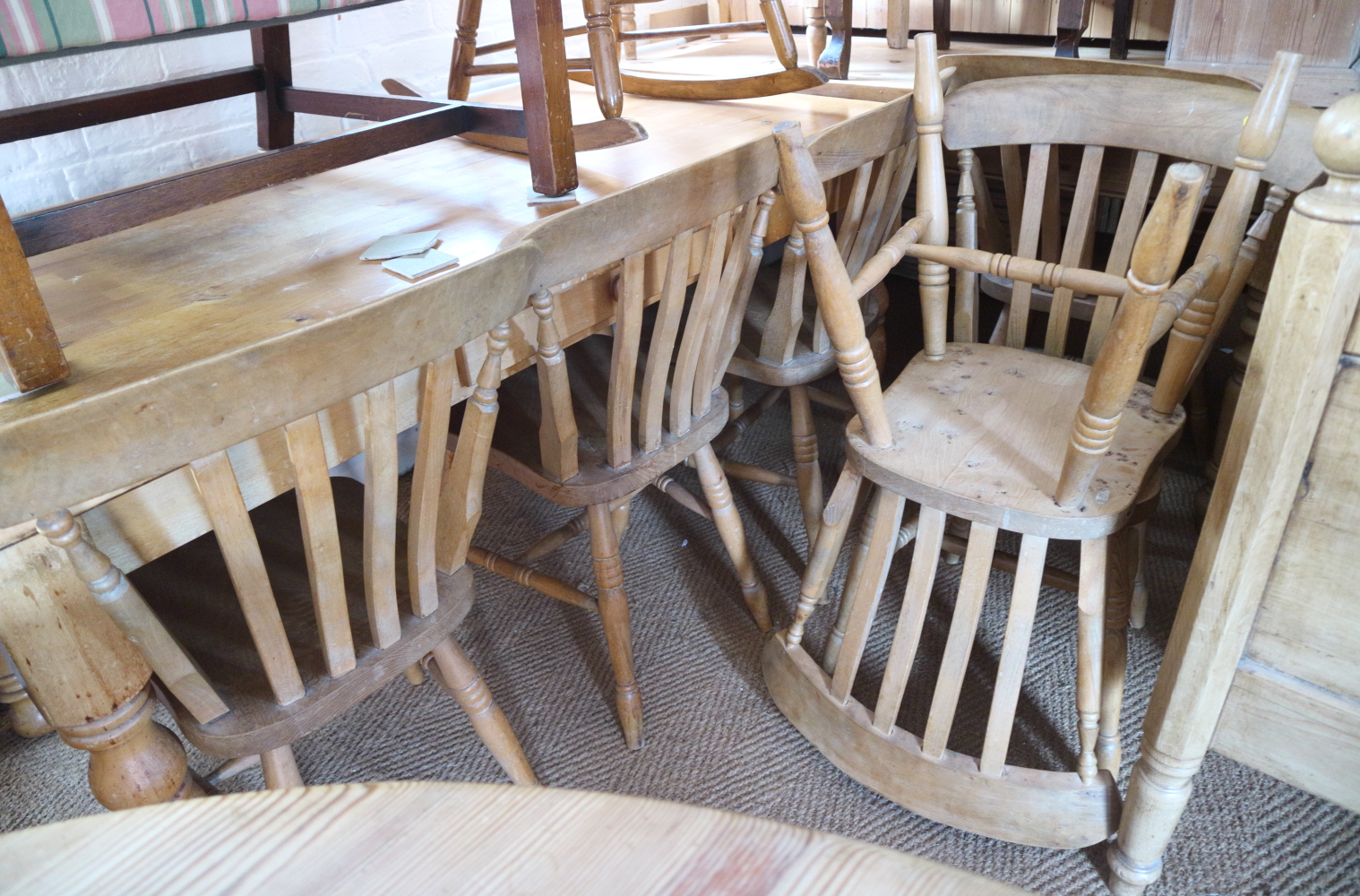 A set of six Windsor lath back dining chairs with elm panel seats