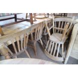 A set of six Windsor lath back dining chairs with elm panel seats