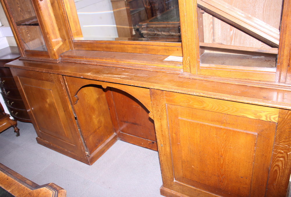 A late Victorian Aesthetic Movement ash, box and ebony inlaid bookcase enclosed by four glazed doors - Image 3 of 4