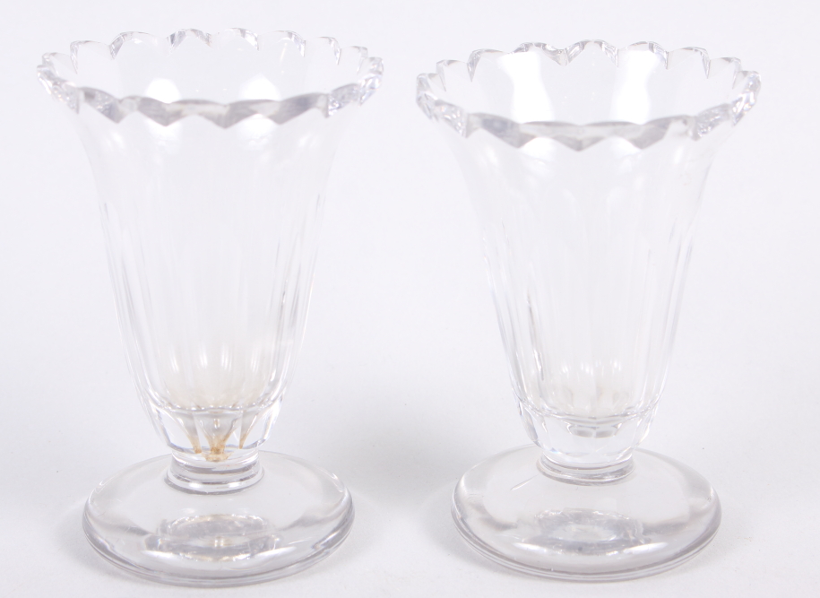 A pair of early 19th century cut glass custards, on circular feet, 4" high